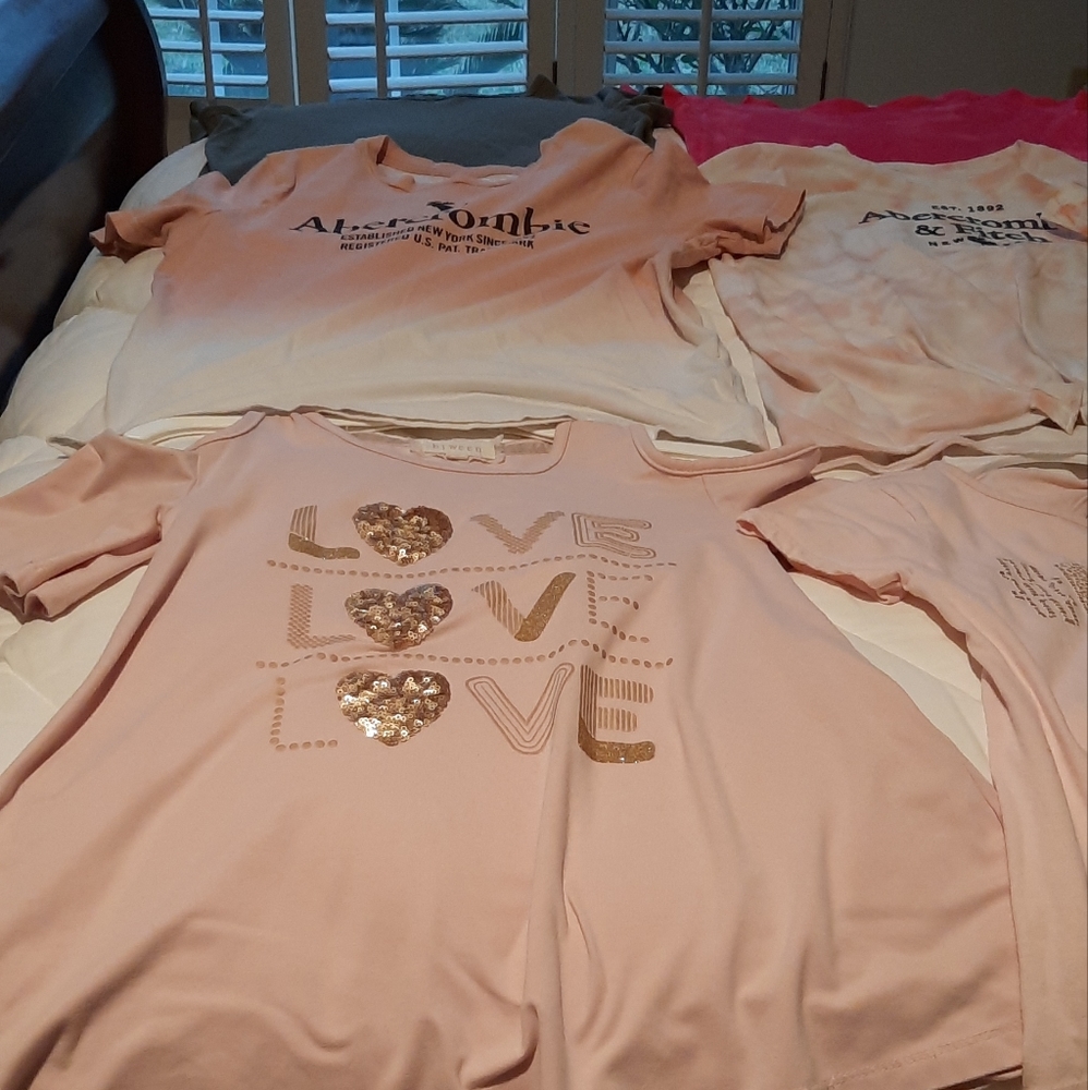 brand name tops and two swimming sets